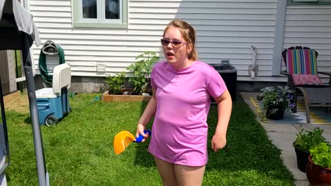 Throwing water balloons