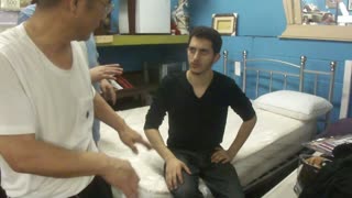 Luodong Briefly Massages Skinny White Man At The Furniture Store