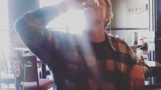 Mustached man drops glass eye in drink