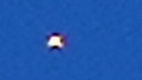 UFO : Sphere of Light Spins in the Sky