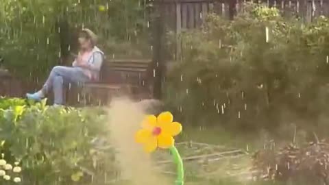 Dancing flower watering sprinkler