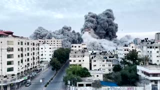 Gaza buildings collapse after Israeli air strike