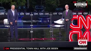 Biden and Cooper ignore social distancing when cameras are off