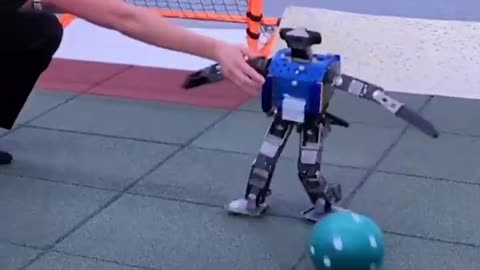 A Bipedal Robot Mastering Agile Football Skills Using Deep Reinforcement Learning Mimicking Human Learning Through Trial & Error