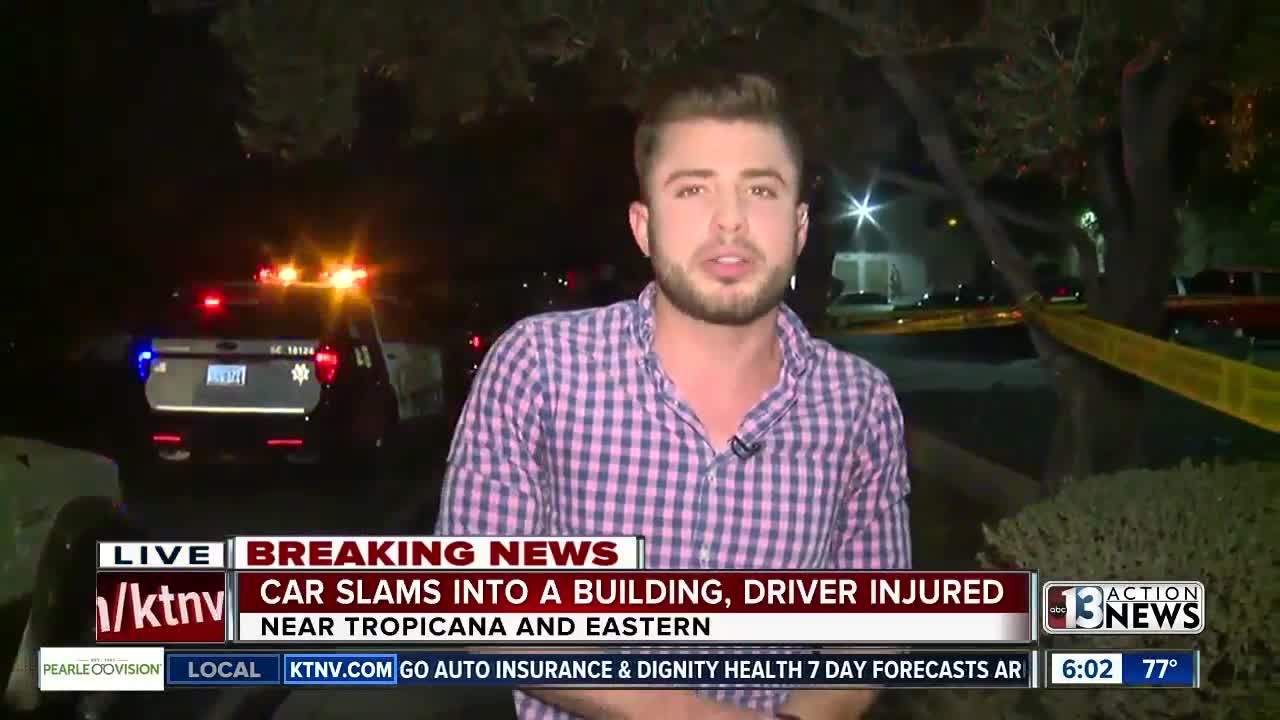 Car slams into building, driver injured