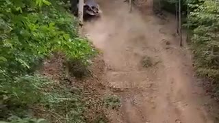 Side by Side Rolls Down Hill After Climbing Attempt