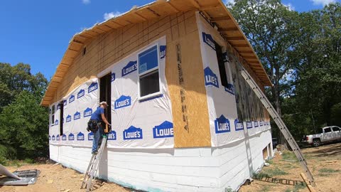 Framing in the gable vents, installing windows, Brother and nephew showed up.