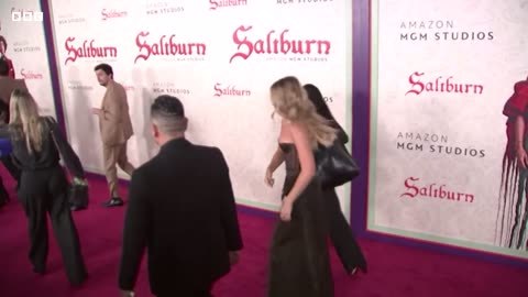 Margot Robbie unable to speak at Saltburn premiere