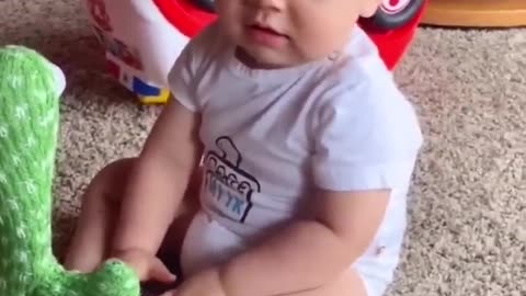 Babies play dancing cactus toys. cutest