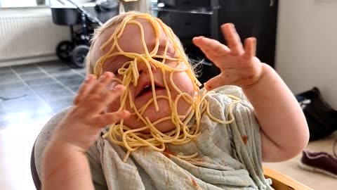 Baby Pours Plate of Pasta Straight Onto Her Face