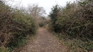 Hiking past holiday standing caravans to get to the coast