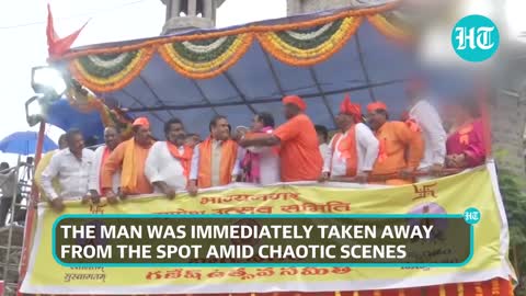 Drama at Assam CM's rally_ Man storms stage, snatches mic amid chaotic scenes in Hyderabad