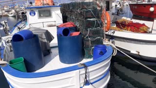 Fisherman boats with keepnets