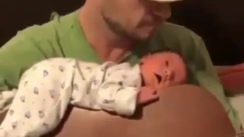 Cute baby sleeps on his father's guitar while he is playing the guitar🥰🥰🥰