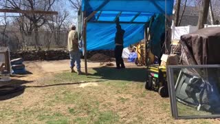 Bill and friends helping him move this “ mobile shack”