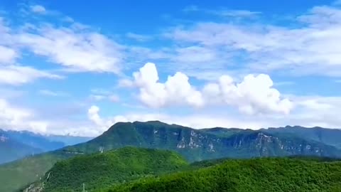 The high mountains, the blue sky