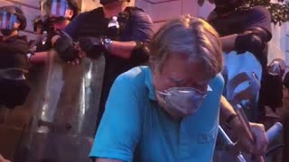 Frail Man Takes a Knee on the Front Lines of Protest