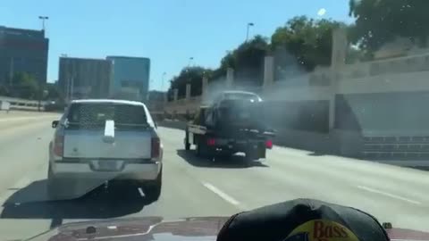 Flatbed Truck Tows Flaming Car