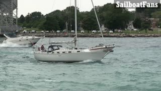 Ripple Sailboat Cruising Up St Clair River In Great Lakes