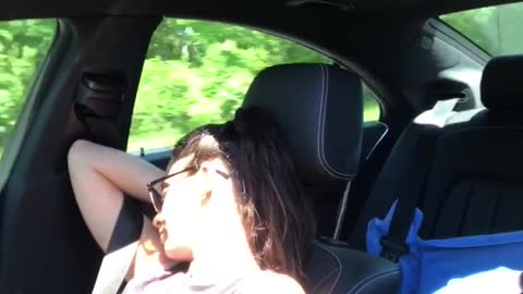 Man scared woman asleep on passenger seat of car