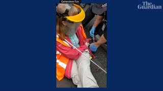 Just Stop Oil: protester glues hand to central London road