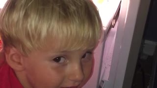 Boy Spends Warm Summer Day Relaxing In Freezer And Eating Moms Candy