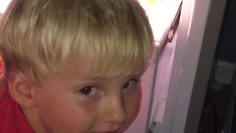 Boy Spends Warm Summer Day Relaxing In Freezer And Eating Moms Candy