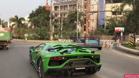 green lamborghini aventador in indian roads