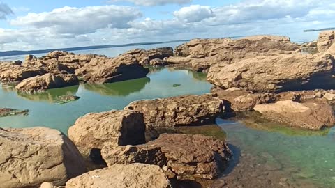 rocks, river, sky. beautiful big stones on the shore