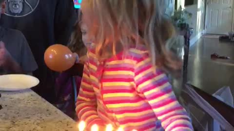 Little Girl Tries To Blow Out Birthday Candles, Lights Her Hair On Fire