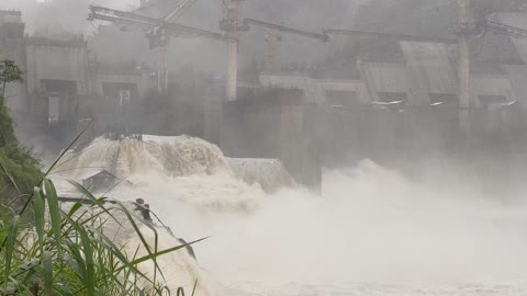 Working Dam site, water comes over the top🌊