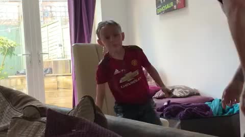 Dad Surprises Son with Hidden Water Balloon Gag