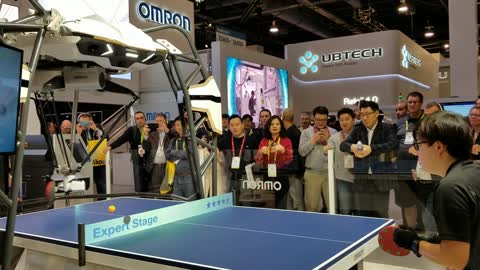 Human vs Robot Ping Pong at Consumer Electronics Show in Las Vegas, Nevada