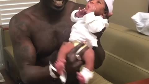 Dad Dances With His 2-day-old Baby Daughter