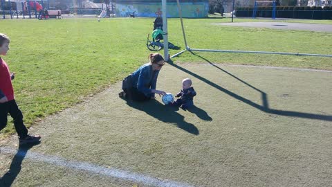 Boy Kicks Soccer Ball Into Baby Brother's Face