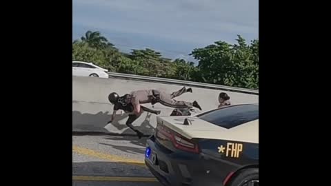 Florida State Trooper takes down motorcyclist in a large group of illegal riders on highway