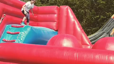 This Ninja Warrior Loves To Play In An Inflatable Park