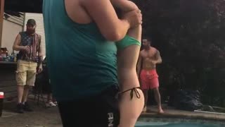 Girl thrown by big man into pool fail