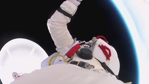 A man jumps on the earth from space