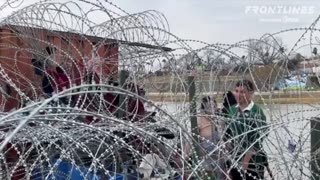 Razor wire barriers put up by the Texas National Guard
