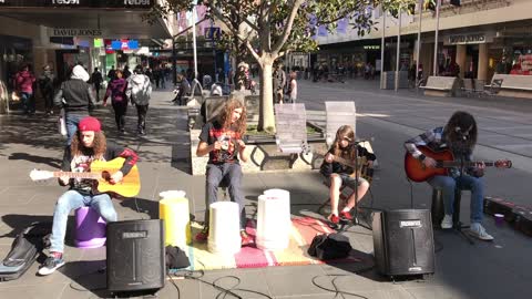 Kids Cover Metallica In Shopping Center