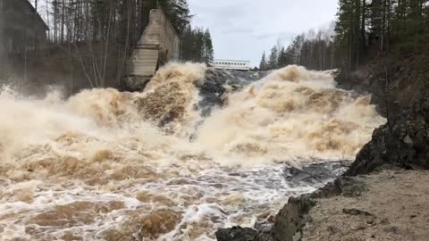 Rough current at the dam, slow motion video