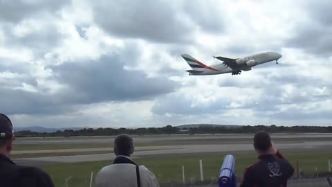 Plane aborts landing just inches from the runway!