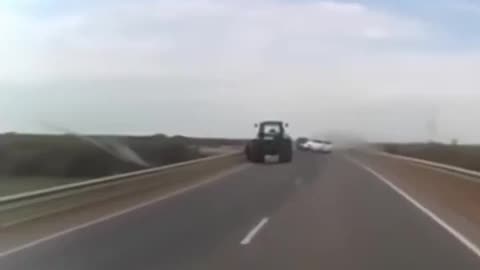 Car Crashes Into Tractor