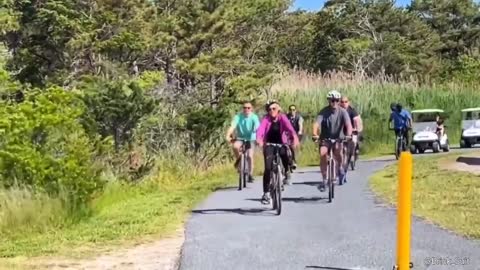 Why Joe Biden's bicycle crash happened because he saw a small girl in the crowd.