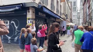 Rouen's cathedral catches fire, smoke rises from spire