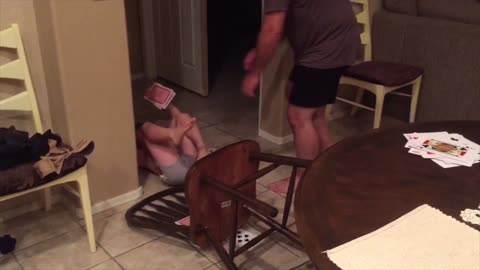 Little Boy Falls Off Chair And Pees His Pants While Playing Game With Dad