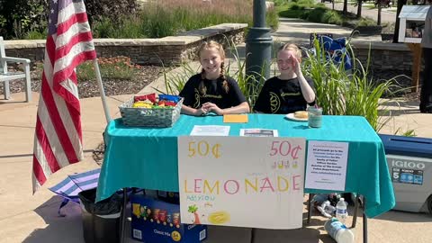 Girls sell lemonade to raise money for family of fallen Colorado police officer