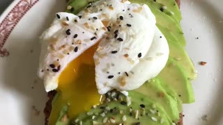 TASTY YOLK LAVA OVER AVOCADO TOAST