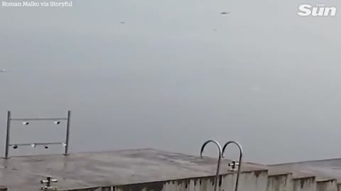 Moment 'Russian' helicopter is shot down over reservoir near Kyiv